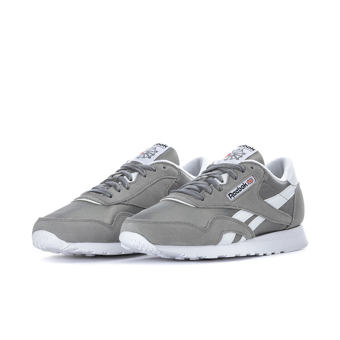 Men's Reebok low-top sneakers, dark gray and white, front side-by-side view