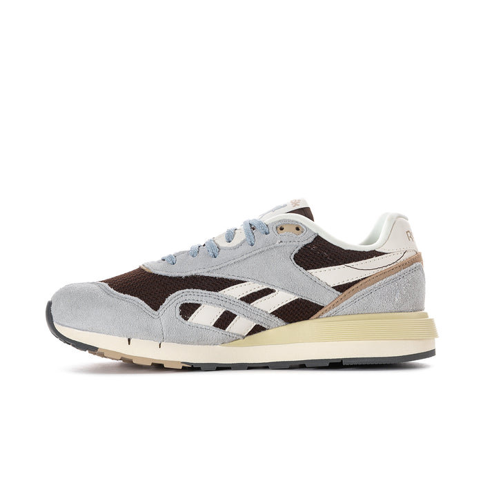 Women's Reebok sneakers angled side, gray suede with brown overlays and cream outsole
