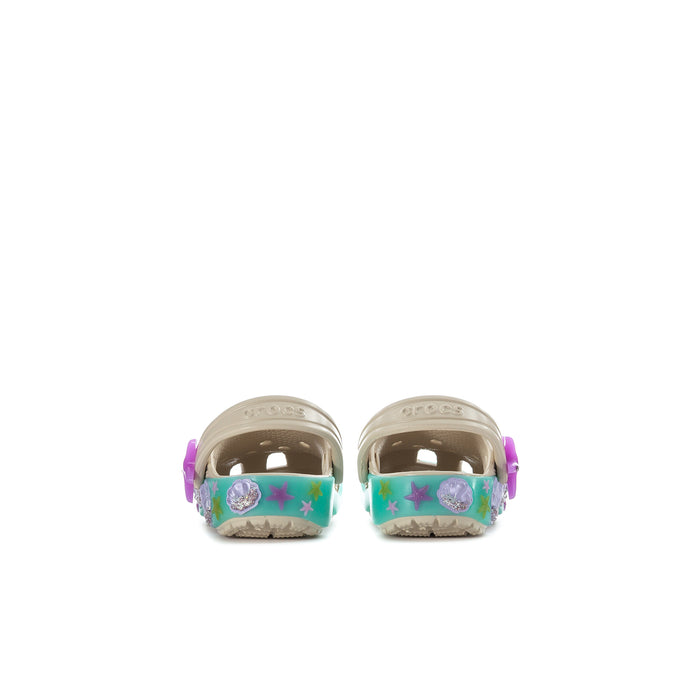 Toddler cream clogs with teal-backed straps, purple star decor on the heel