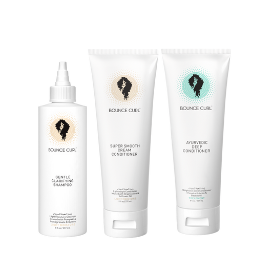 Bounce Curl Cleanse and Hydrate Kit with the Gentle Clarifying Shampoo, Super Smooth Cream Conditioner, and Ayurvedic Deep Conditioner bottle