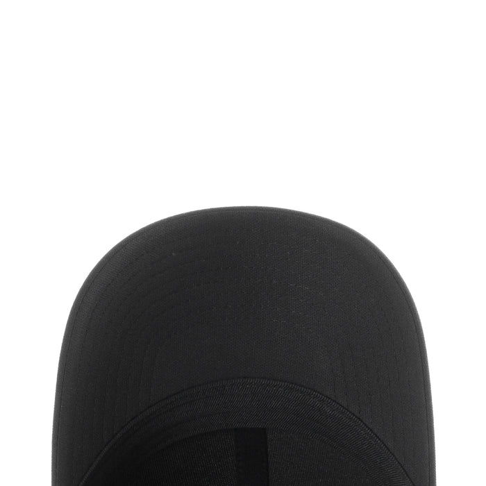 Black Nike cap crown fabric close-up with textured panel stitching