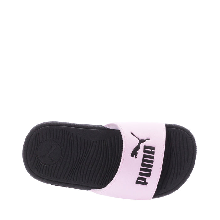 Kids pink slide sandals with black textured footbed and PUMA branding