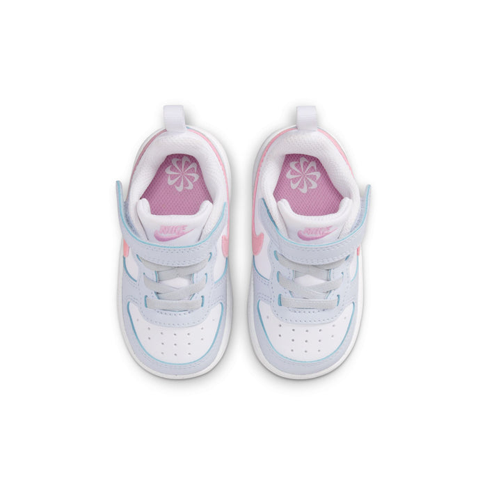 Toddler sneakers showing padded collar and interior lining, pink sockliner detail