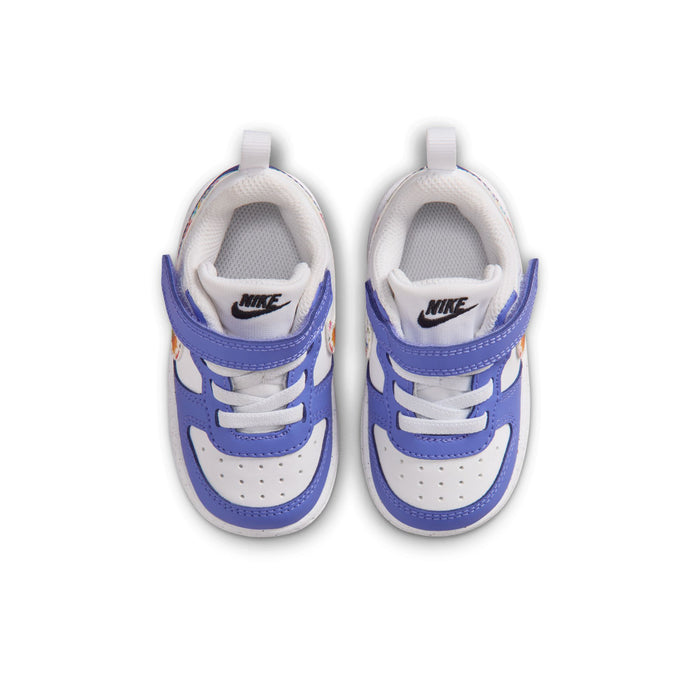 Toddler low-top sneakers, white interior with blue heel tabs and NIKE branding