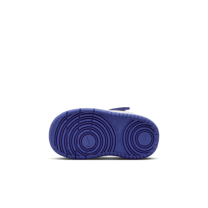 Toddler sneaker outsole, blue tread with circular traction pattern