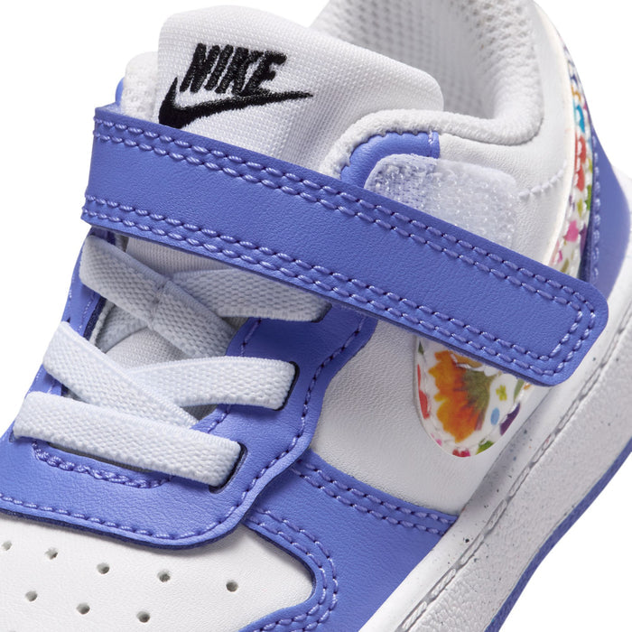 Toddler sneaker upper close-up, blue strap and NIKE heel logo
