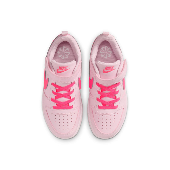 Kids sneakers with light pink upper, bright pink laces, and logo on the tongue