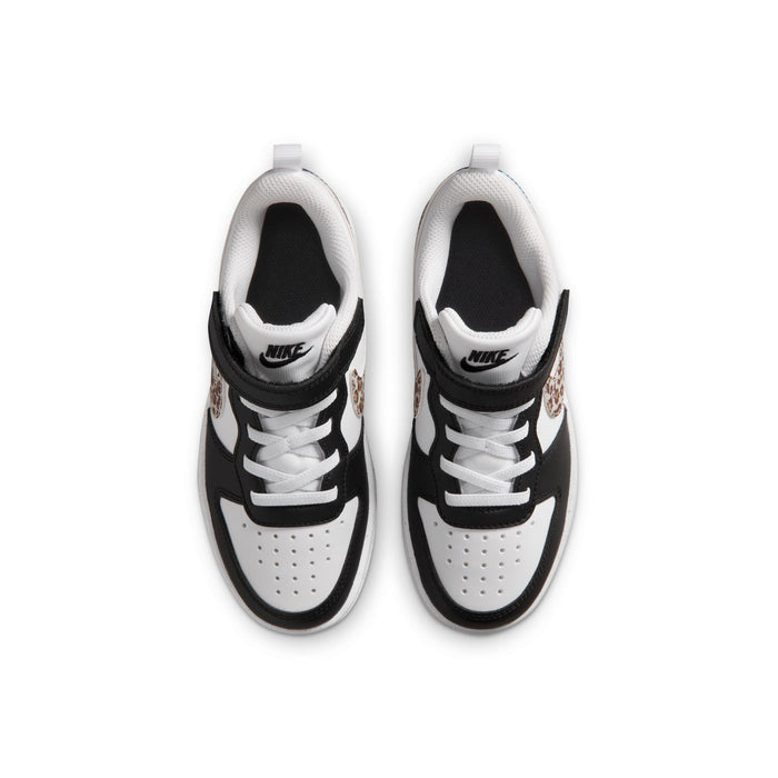 Kids low-top sneakers with white laces and black heel panel; leopard detail on side
