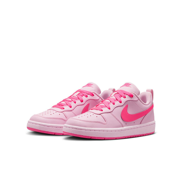 Youth pink low-top sneakers, pink laces, swoosh on side, white midsole