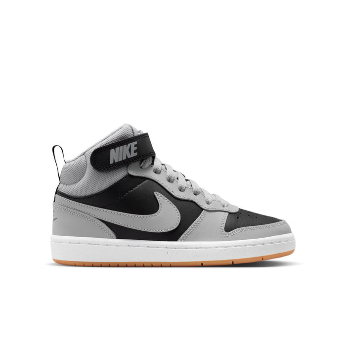 Youth mid-top sneakers in light gray with black Swoosh and gum rubber outsole.