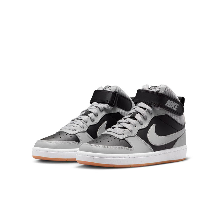 Youth mid-top sneakers, light gray and black with white laces and gum outsole.