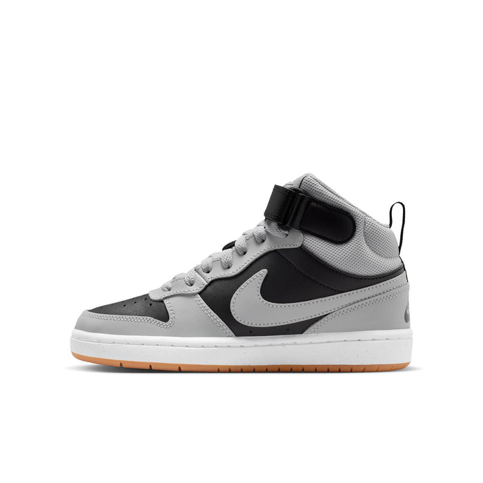 Youth mid-top sneakers with hook strap, gray leather with black Swoosh and gum sole.
