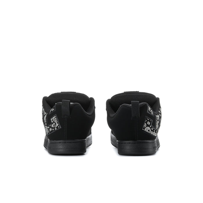 Black low-top sneakers with rear strap tab and lace-up opening.