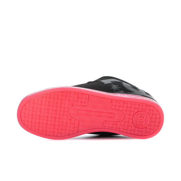 Women’s sneaker outsole in bright pink with black logo and tread pattern