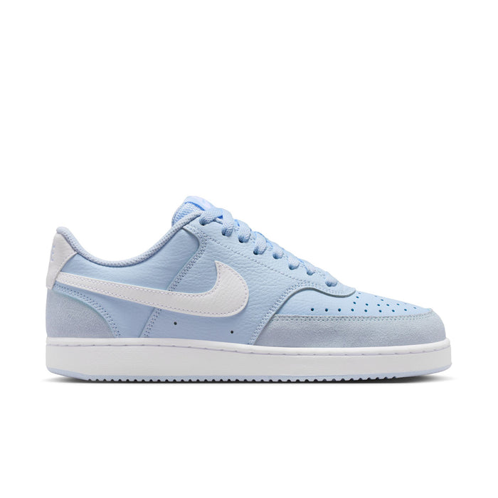 Light blue low-top suede sneakers with white Swoosh and lace-up design.