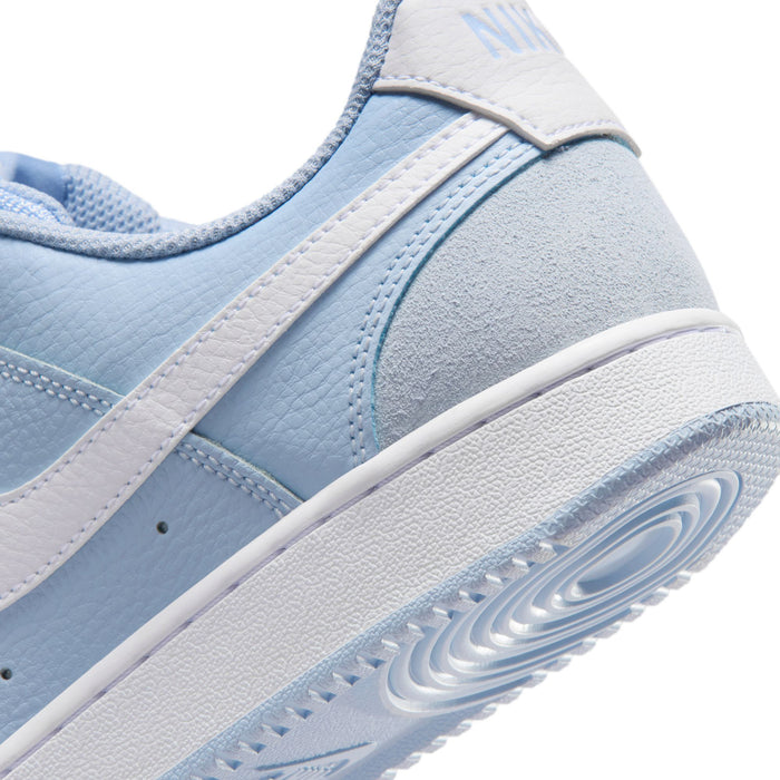 Close-up side view of light blue sneakers with white midsole and grippy outsole.