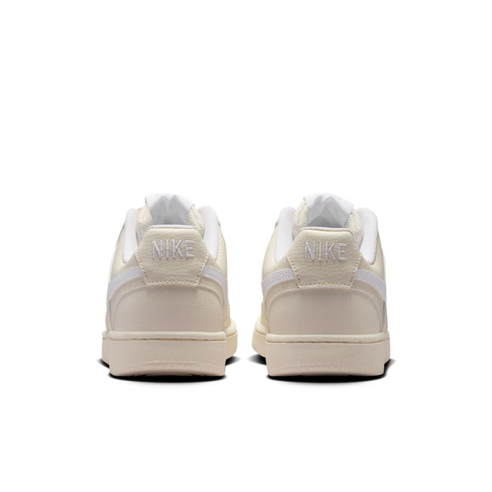 Women’s low-top Nike Court Vision sneakers, cream leather with light blue swoosh