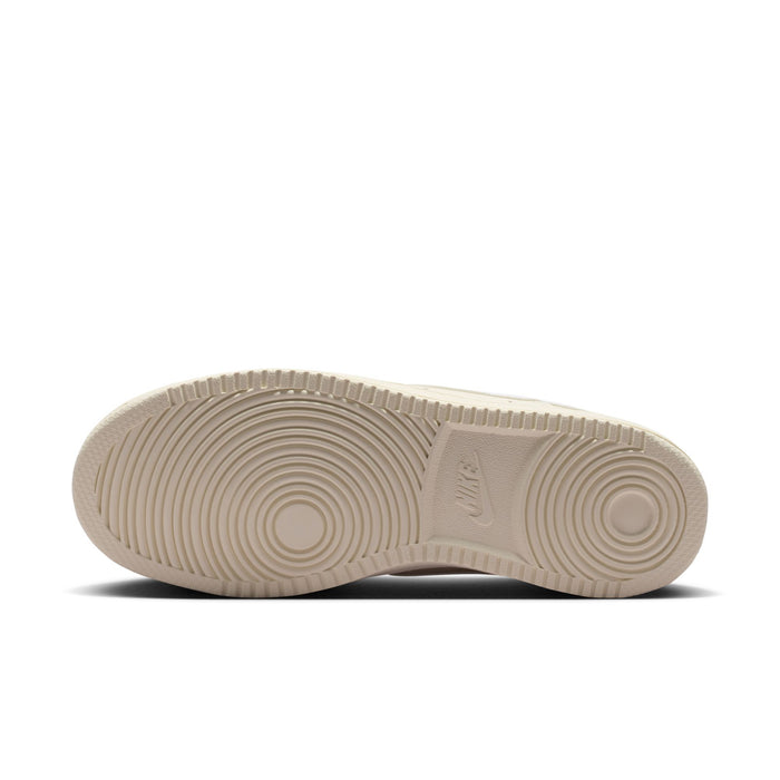 Cream rubber outsole for women’s low-top Nike sneakers with circular traction