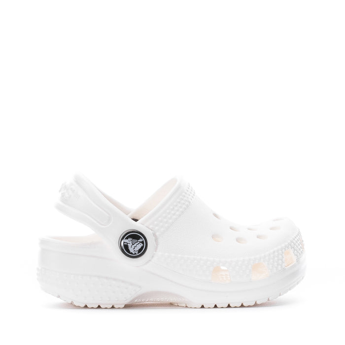 Infant white Crocs clog with heel strap, round toe, and perforated upper.