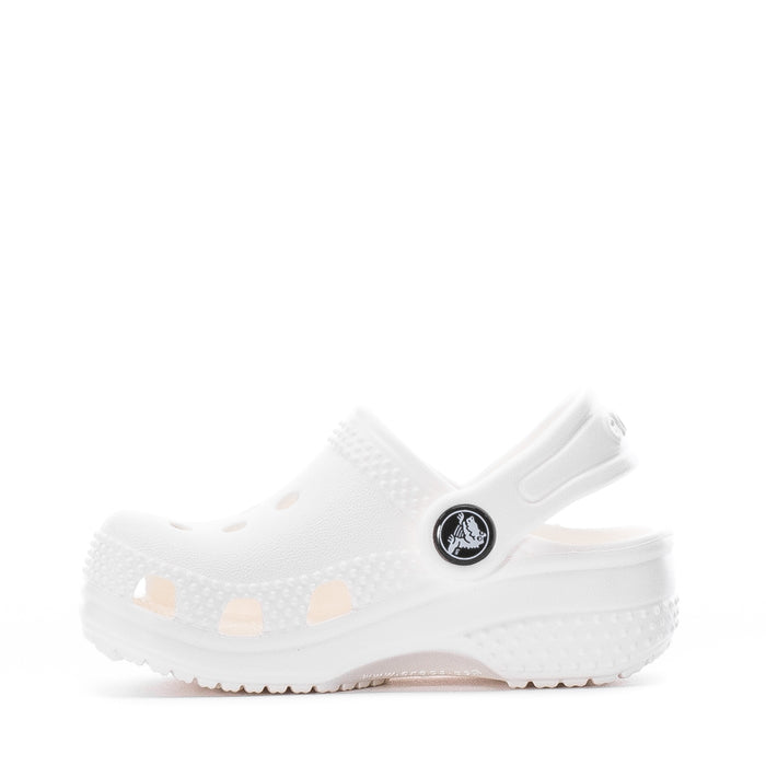 Infant white Crocs clog with side strap and perforated texture, round toe.