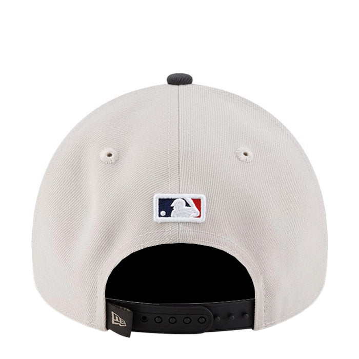 Light beige baseball cap back with MLB logo patch and snapback adjustable band