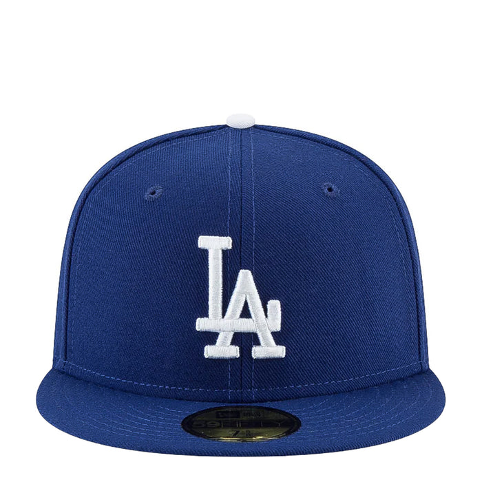Royal blue baseball cap with white LA logo on front panel