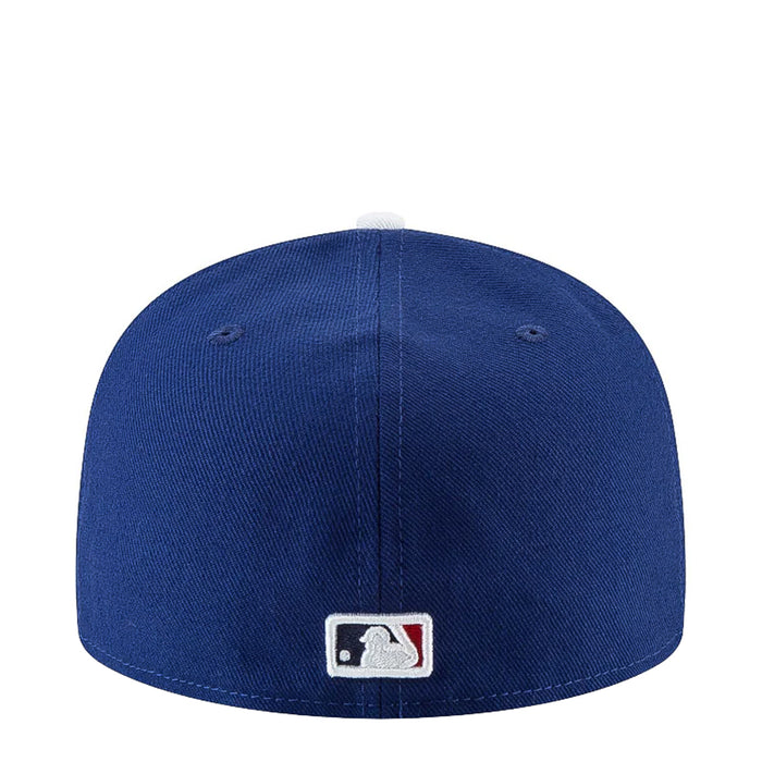 Royal blue baseball cap with MLB logo patch on front hem