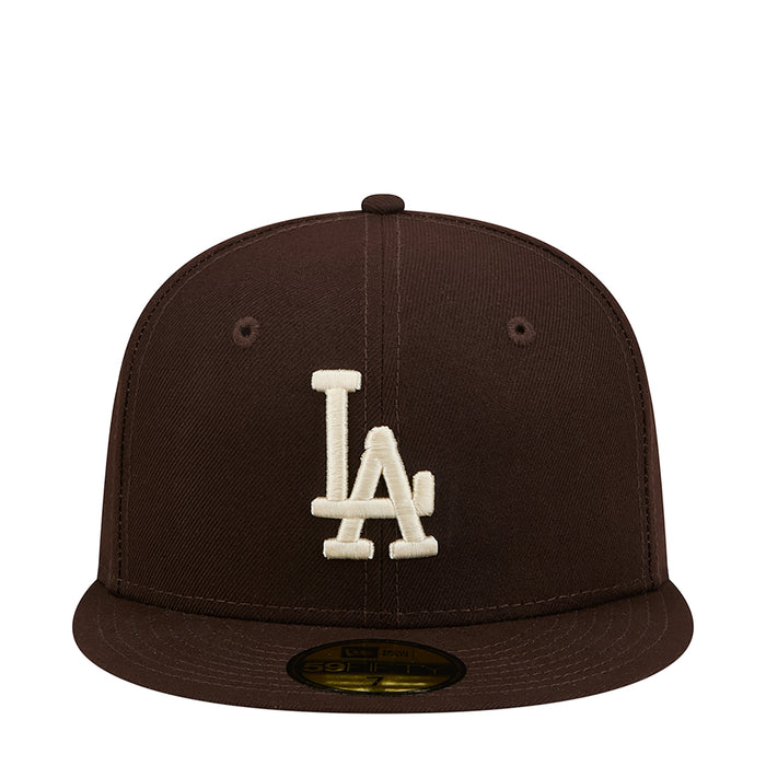 Brown baseball cap with white LA logo on front and dark brim