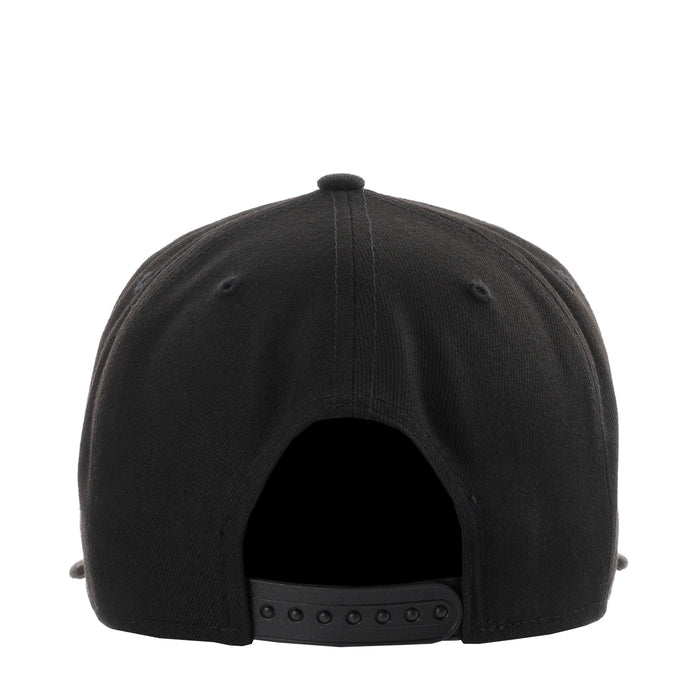 Black baseball cap back view with adjustable strap and ventilation eyelets