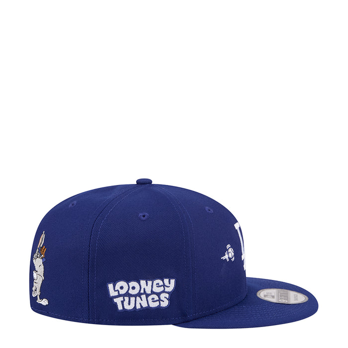 Navy snapback cap with Looney Tunes text and side Bugs Bunny illustration.