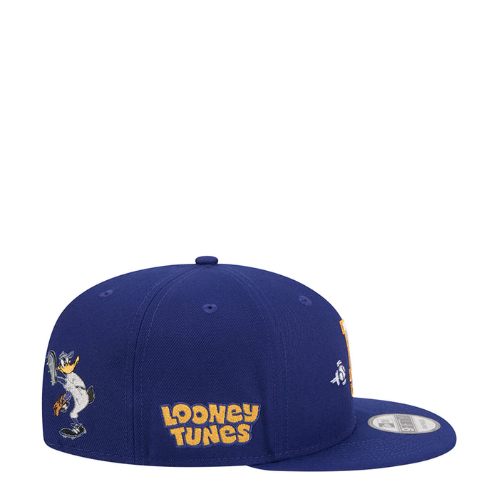 Navy baseball cap with Looney Tunes logo and Daffy Duck graphic, flat brim