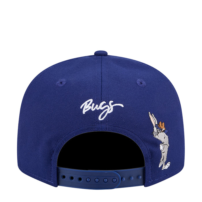 Navy snapback cap with 'Bugs' script and Bugs Bunny graphic on back.