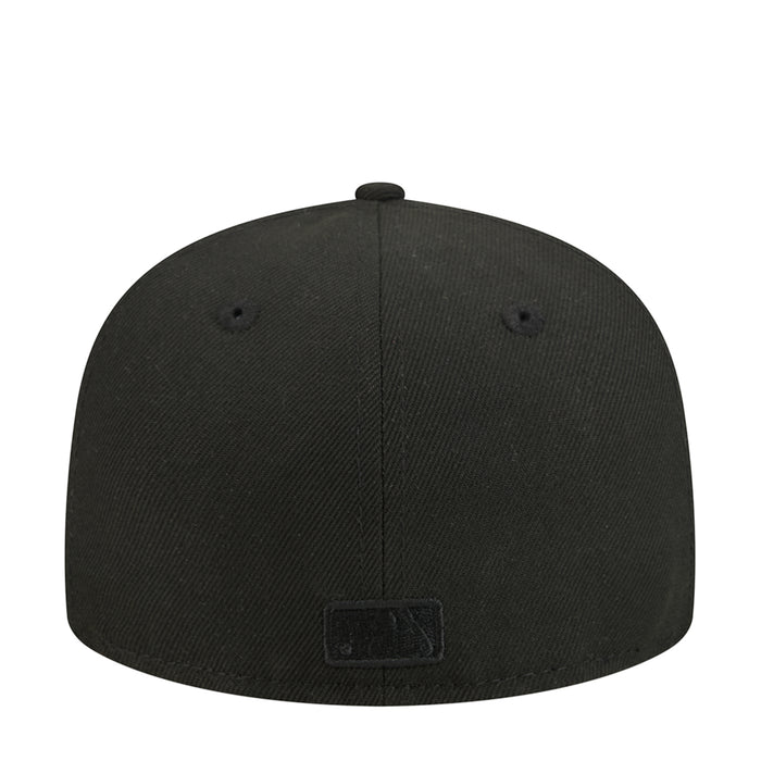 Black baseball cap back view with small rectangular fabric patch