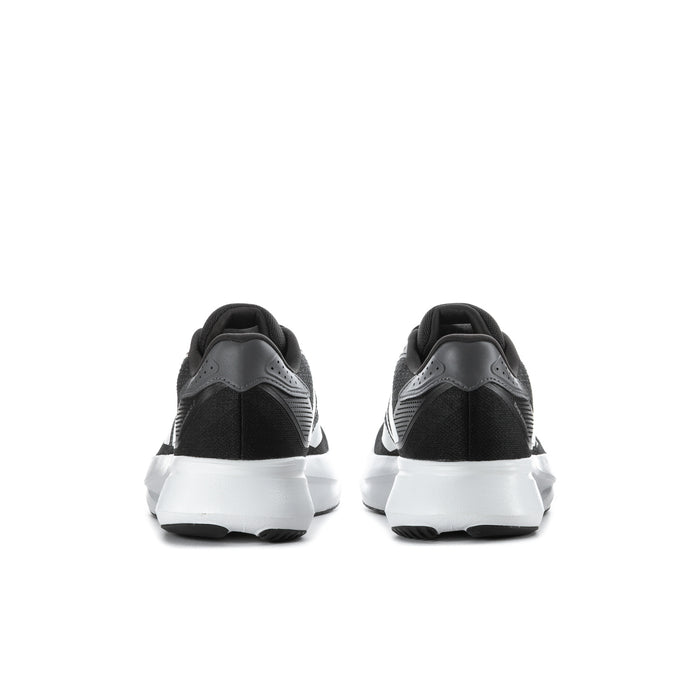 Black men's running sneakers from heel with white outsole and rear tab