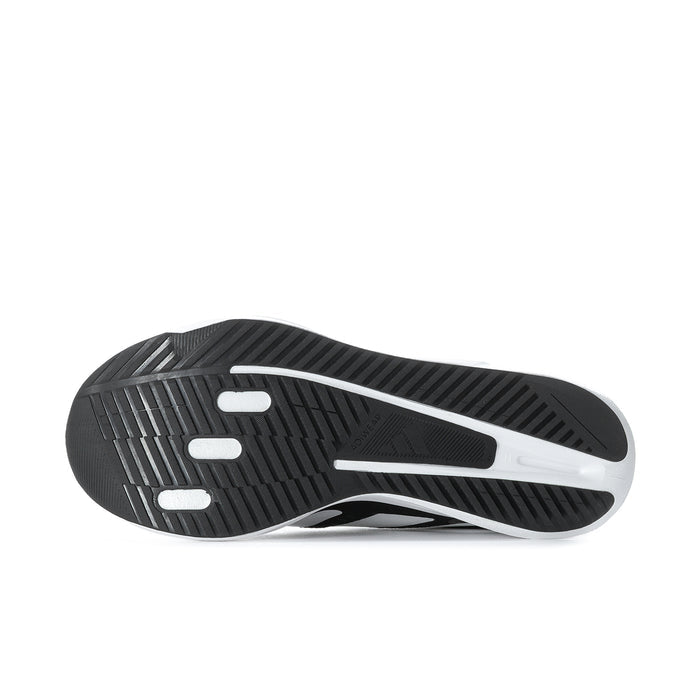Black rubber outsole with white midsole edge and traction grooves