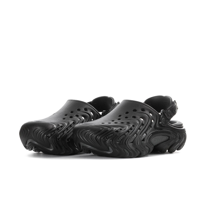 Men's black clogs with perforated top and textured molded sole, side view