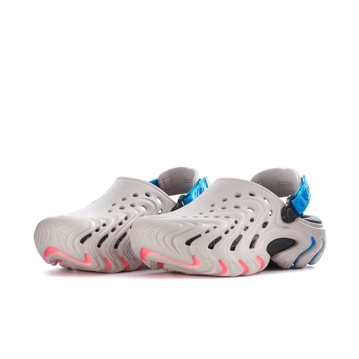 Men's white clogs side view with perforations and blue strap detail