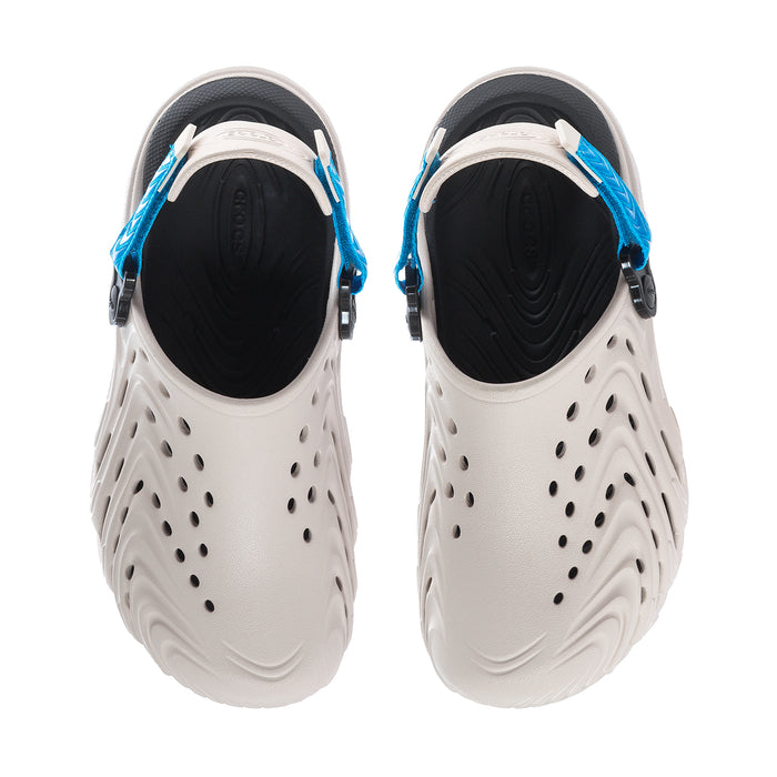 Men's clogs back view with black lining, blue straps, and vented white uppers