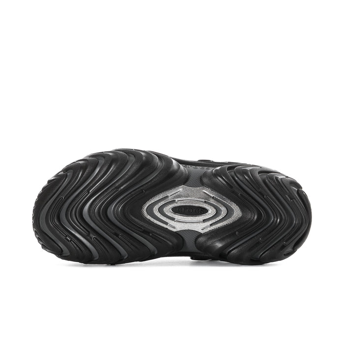 Men's black clogs with textured outsole and molded wave traction pattern