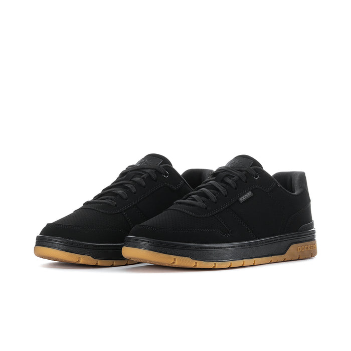 Pair of black lace-up low-top sneakers with gum outsole detail and tread.