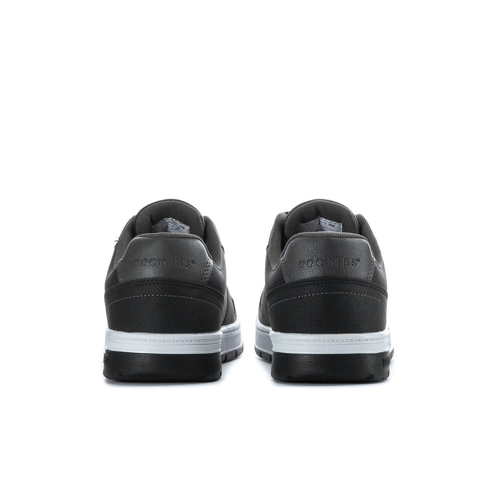 Black low-top sneakers with rear heel tabs and white stripe on sole