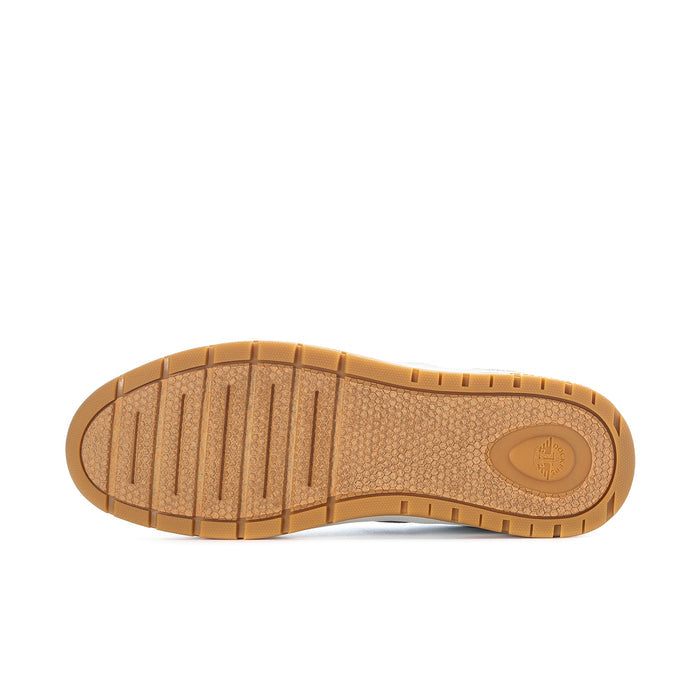Brown gum outsole for men's low-top sneakers with tread and round logo patch.