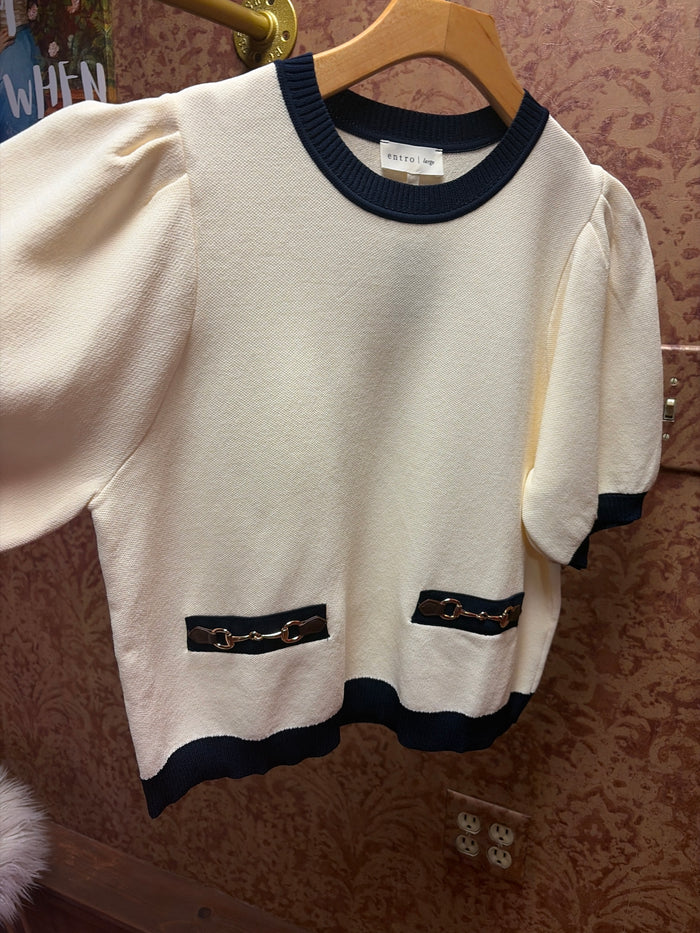 Entro equestrian sweater in cozy knit, featuring a classic design with ribbed cuffs and collar, perfect for riding or casual wear.