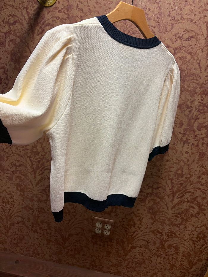 Entro equestrian sweater in soft knit, featuring a classic design and ribbed cuffs, ideal for riding and casual wear.