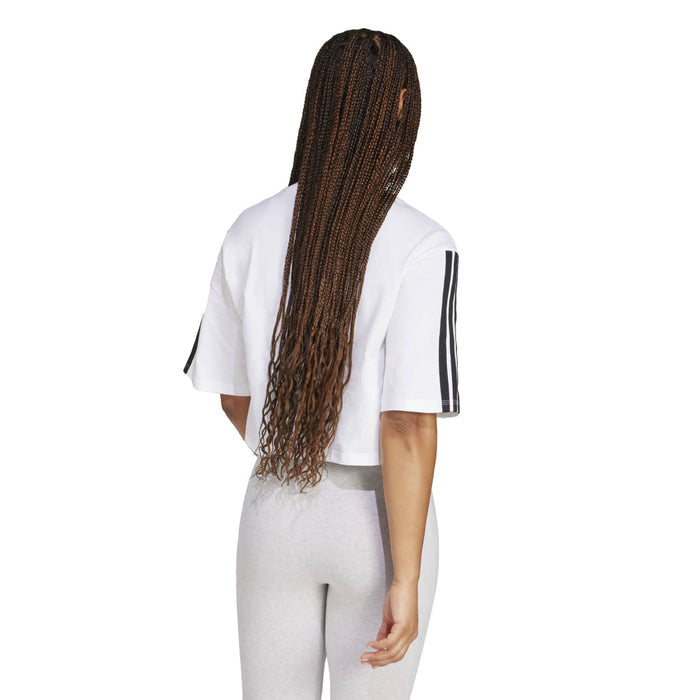 Back view of white women's loose t-shirt with black 3-stripe sleeves
