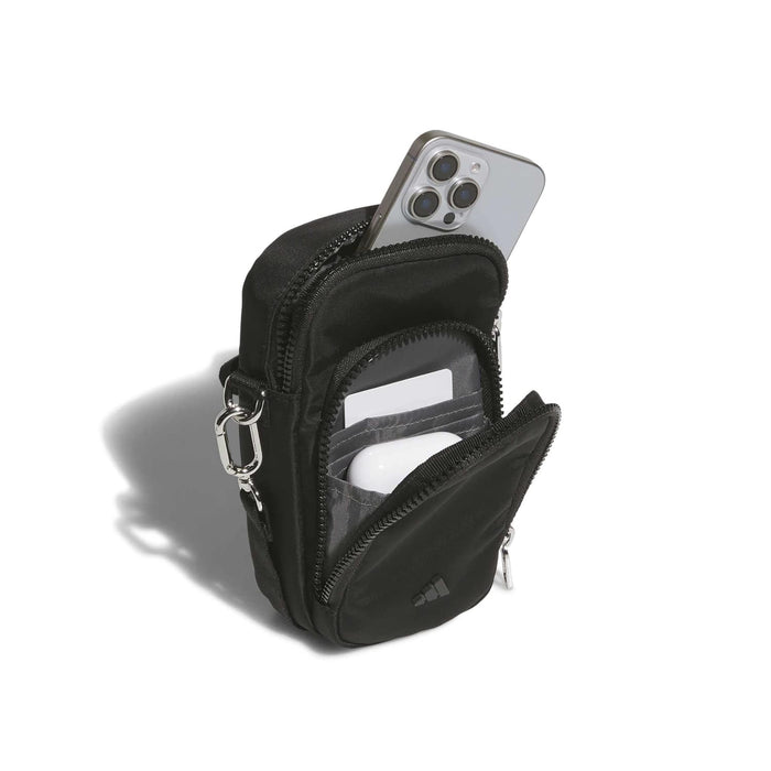 Black crossbody phone pouch open, showing card slots and a phone inside