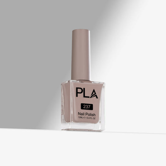 PLA nail polish bottle with gray polish on a gray background