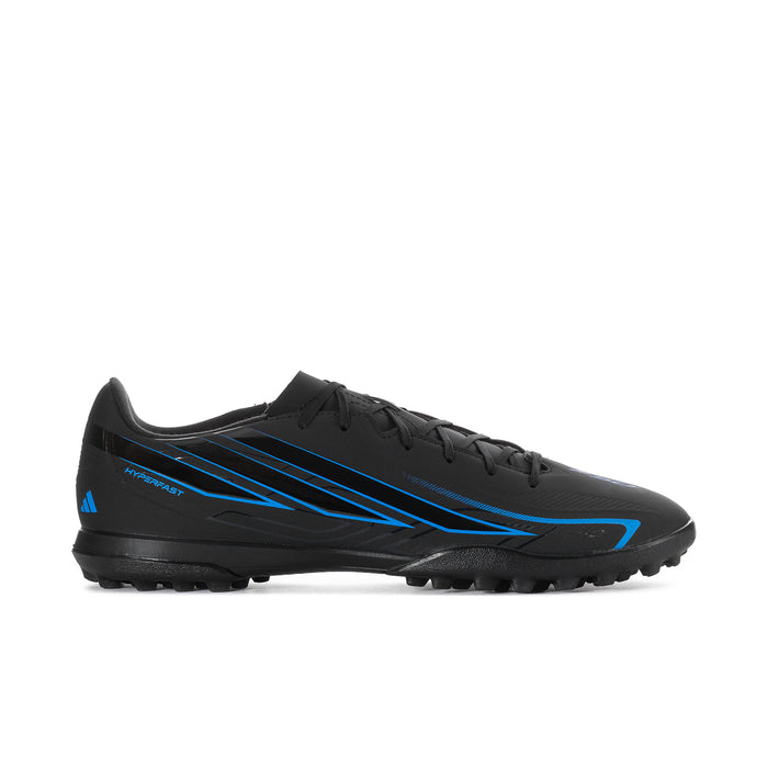 Mens black soccer cleat with blue accents, lace-up design and molded rubber studs