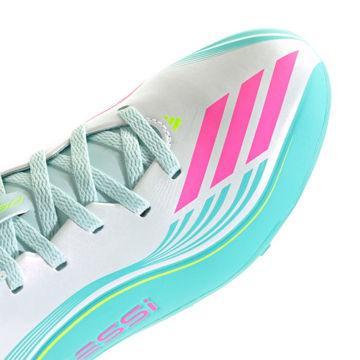 Kids soccer cleat upper close-up, white with aqua laces and pink side stripes