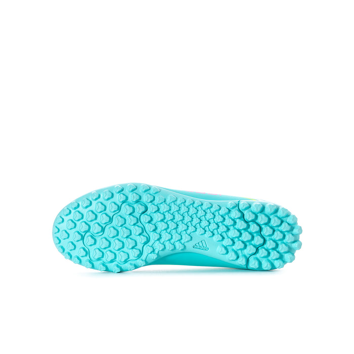 Bottom view of youth soccer cleat with textured aqua turf outsole and grip studs